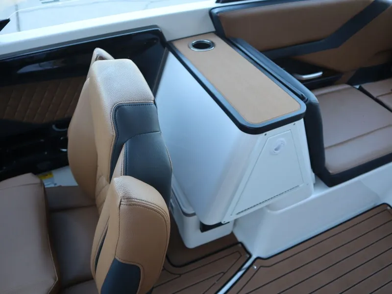 Slide: The Image of 2026 Yamaha Boats 252SD interior with tan seating and sleek design. - 14