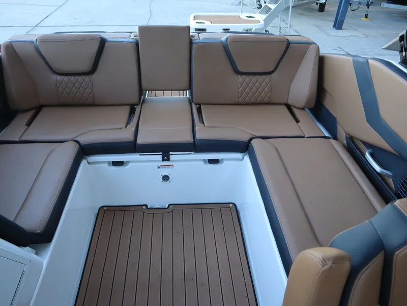 Slide: The Image of 2026 Yamaha Boats 252SD interior seating with brown and black upholstery. - 15