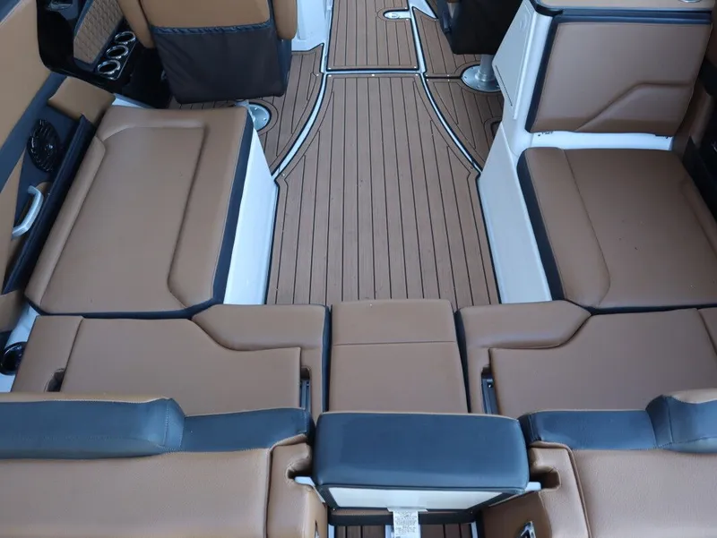 Slide: The Image of 2026 Yamaha Boats 252SD interior with brown seating and sleek deck design. - 8