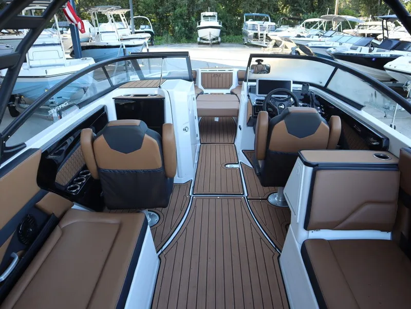 Slide: The Image of 2026 Yamaha Boats 252SD interior with luxurious seating and modern dashboard design. - 9