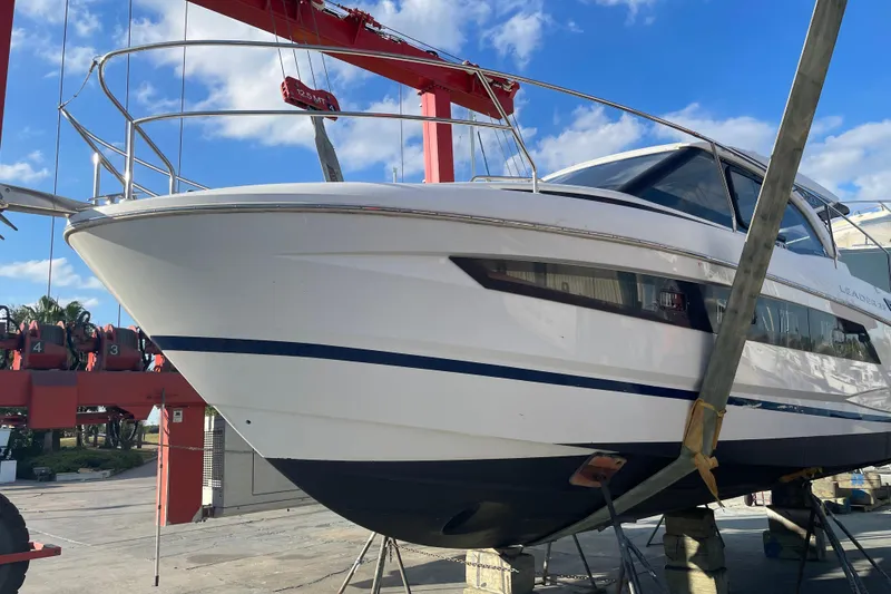 Slide: The Image of 2019 Jeanneau Leader 33 yacht docked under covered marina. - 1