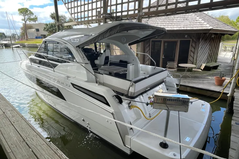 Slide: The Image of Cozy cabin interior of 2019 Jeanneau Leader 33 with bed and seating area. - 30