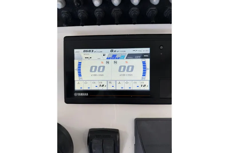 Slide: The Image of Yamaha display on 2019 Contender 35 ST boat dashboard, showing engine metrics. - 12