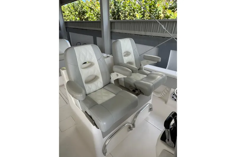 Slide: The Image of 2019 Contender 35 ST boat seats with armrests and quilted design. - 20