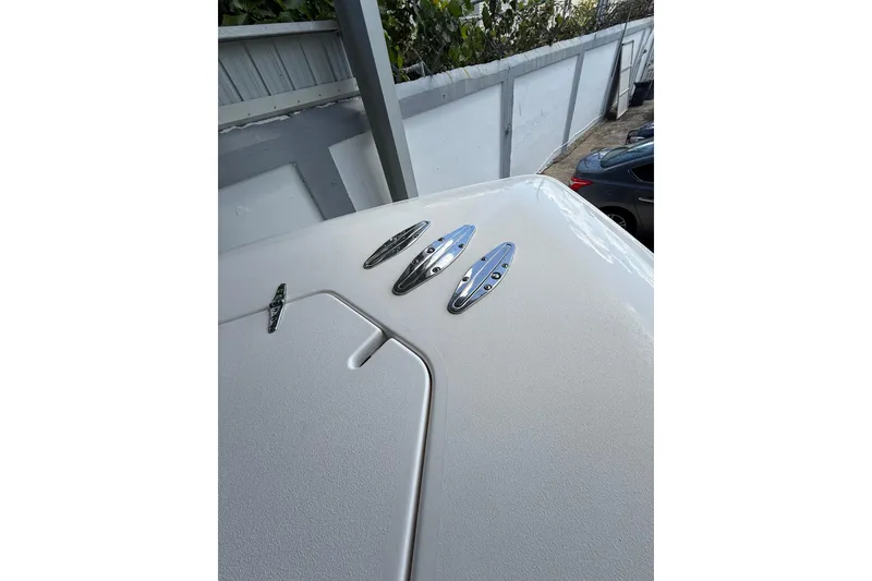 Slide: The Image of 2019 Contender 35 ST boat deck with cleats and textured surface. - 24