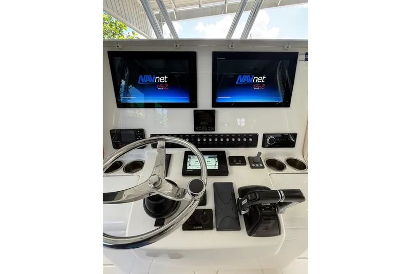 Slide: The Image of 2019 Contender 35 ST boat dashboard with dual NAVnet TZtouch2 displays. - 8