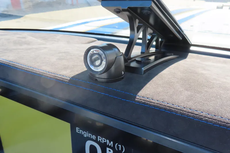 Slide: The Image of 2025 Performance Powerboats P420 dashboard with camera and display screen. - 11