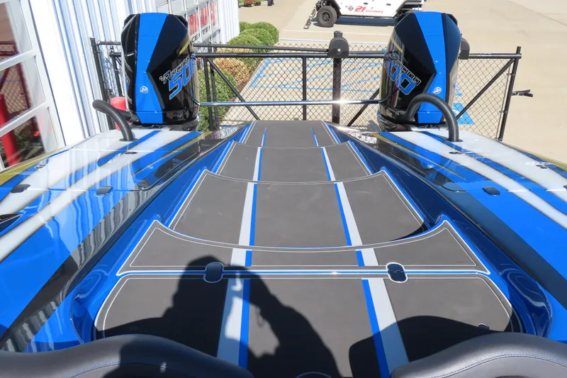 Slide: The Image of 2025 Performance Powerboats P420 with dual engines, blue and gray deck design. - 15