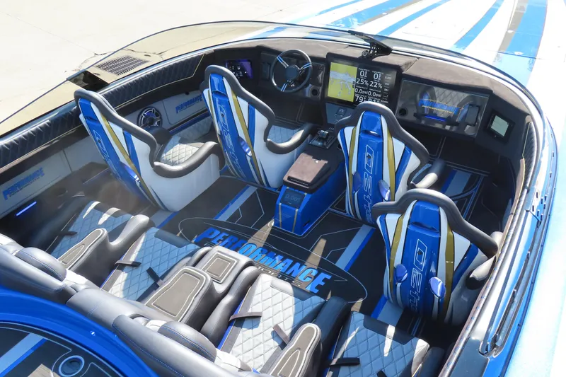 Slide: The Image of Luxurious interior of 2025 Performance Powerboats P420 with blue and white seating and advanced dashboard. - 20