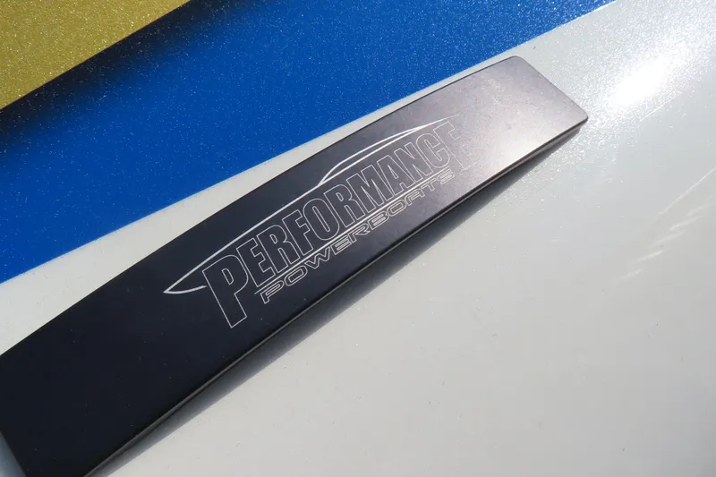 Slide: The Image of 2025 Performance Powerboats P420 logo on sleek, colorful boat surface. - 21