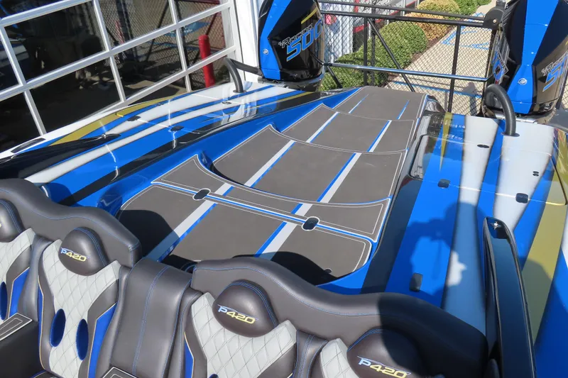 Slide: The Image of 2025 Performance Powerboats P420 with sleek design and dual racing engines. - 6