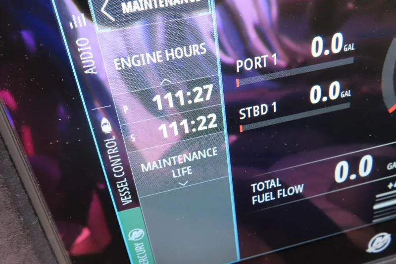 Slide: The Image of Dashboard display of 2025 Performance Powerboats P420 showing engine hours and fuel flow. - 9
