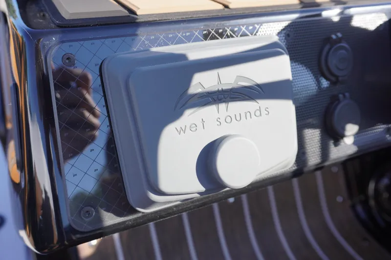 Slide: The Image of Steering console of 2026 Premier 250 Solaris RS boat with Simrad electronics. - 11