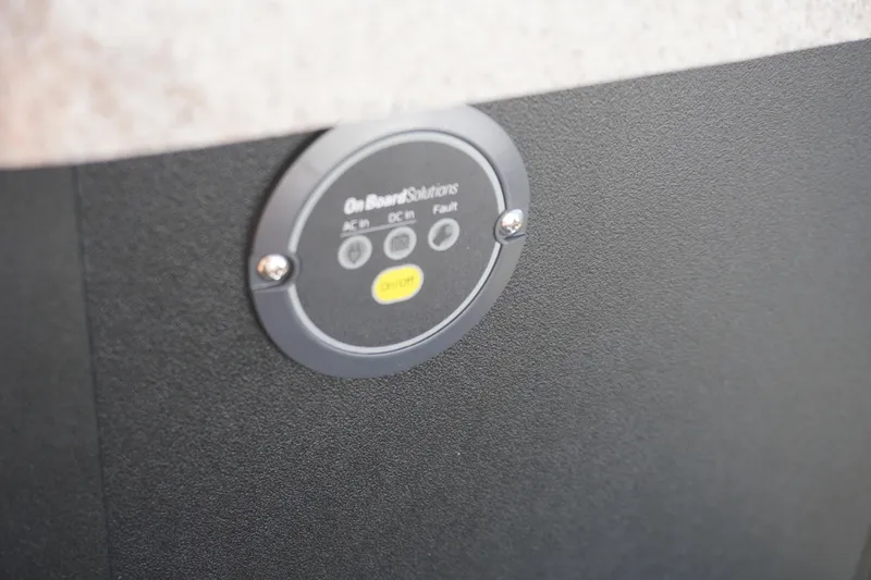 Slide: The Image of Close-up of control buttons on 2026 Premier 250 Solaris RS boat interior. - 26