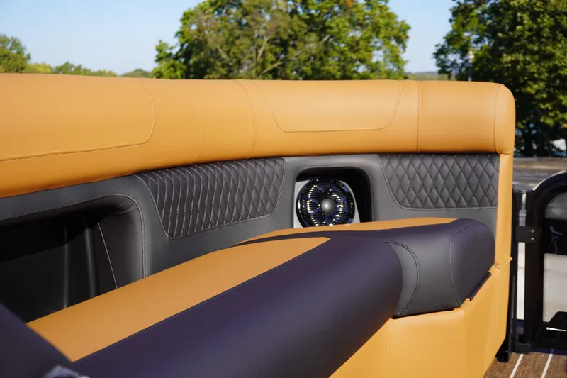 Slide: The Image of Luxurious interior of 2026 Premier 250 Solaris RS with tan and blue upholstery. - 31