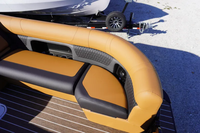 Slide: The Image of Luxurious interior of 2026 Premier 250 Solaris RS pontoon boat with elegant seating. - 5