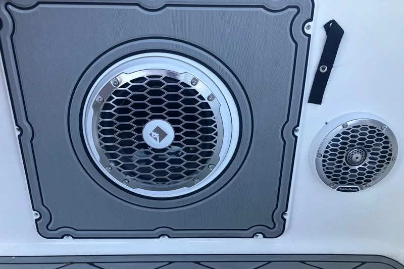 Slide: The Image of Speakers on a 2000 Chaparral Sunesta 232 boat, featuring a sleek design. - 23