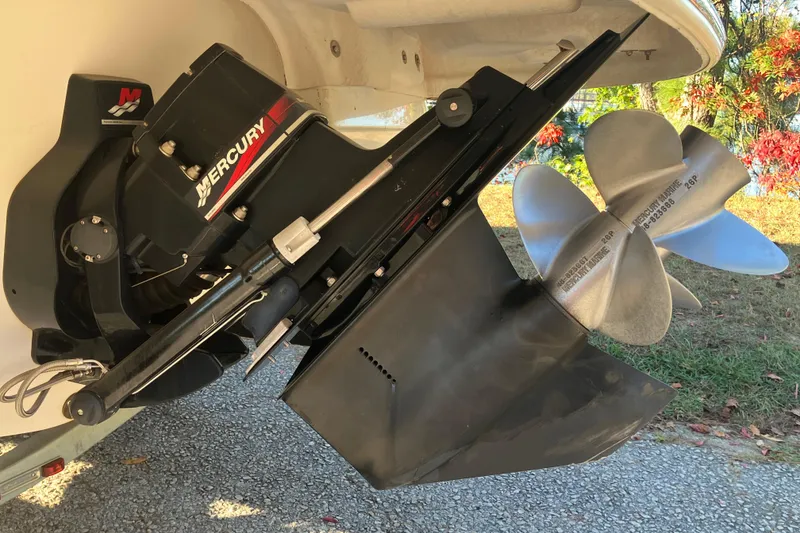 Slide: The Image of 2000 Chaparral Sunesta 232 boat with Mercury outboard motor and propeller. - 25