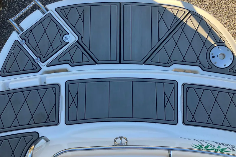Slide: The Image of 2000 Chaparral Sunesta 232 boat deck with custom non-slip padding. - 7