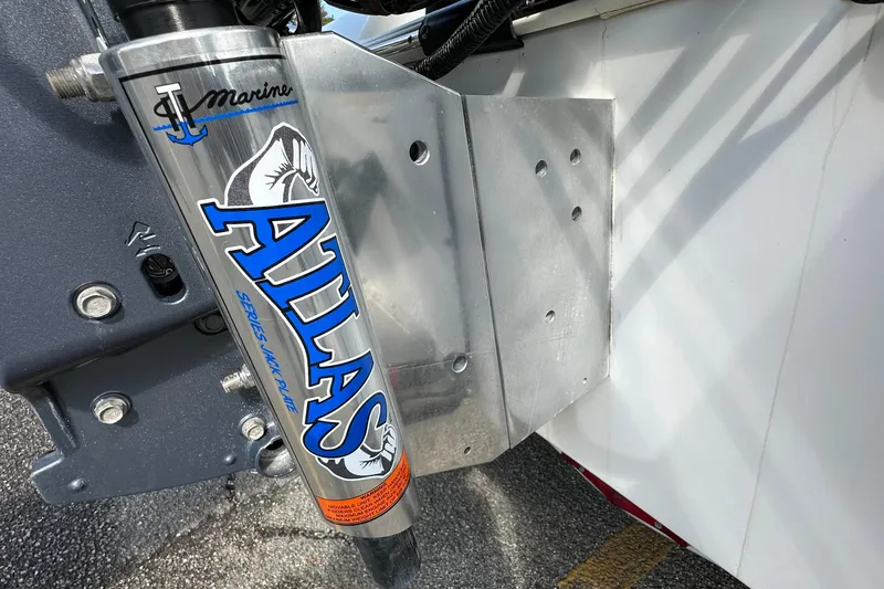 Slide: The Image of Atlas jack plate on 2013 Skeeter SX240 boat, close-up view. - 21