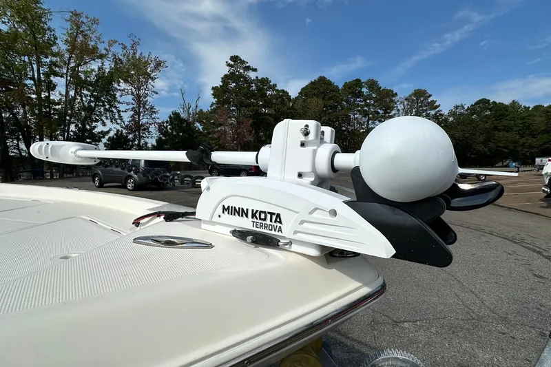 Slide: The Image of Minn Kota Terrova trolling motor on 2013 Skeeter SX240 boat, parked outdoors. - 7