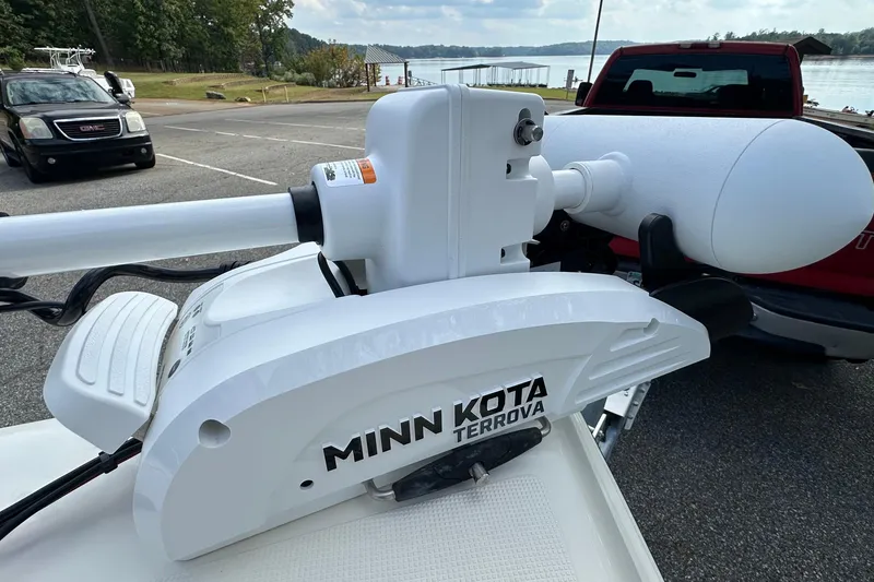 Slide: The Image of Minn Kota Terrova trolling motor on 2013 Skeeter SX240 boat at lakeside. - 8
