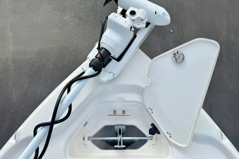 Slide: The Image of Bow of 2026 Key West 210 Bay Reef boat with anchor storage and trolling motor. - 19