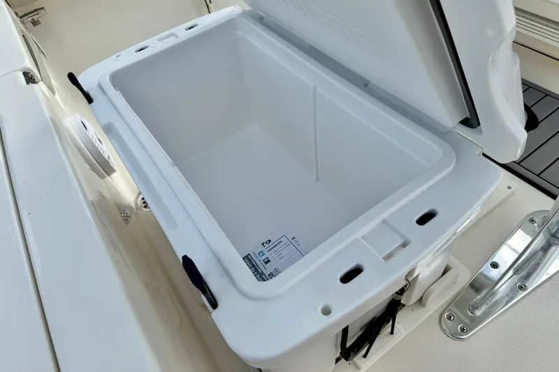 Slide: The Image of Open storage compartment on 2026 Key West 210 Bay Reef boat. - 40