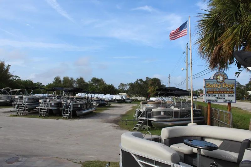 Slide: The Image of Outdoor display of 2016 Starcraft CX 23 FD pontoon boats at Salty Dog Marine Center. - 14