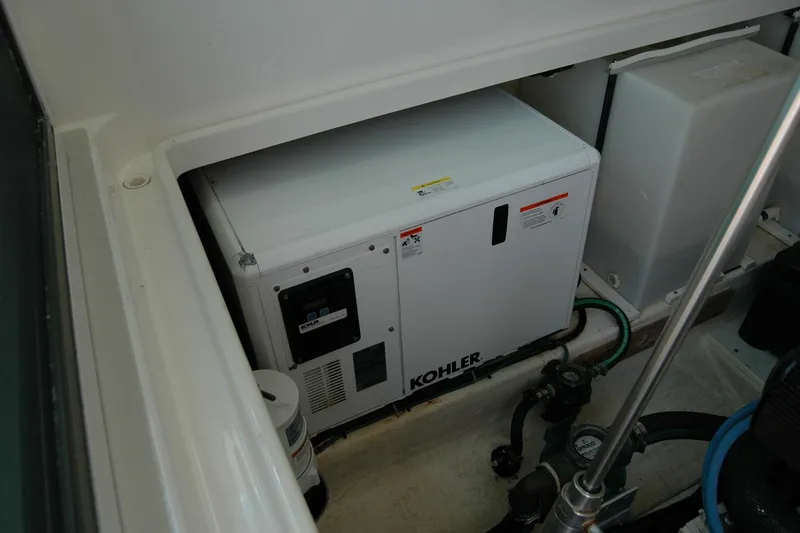 Slide: The Image of 2014 Back Cove 34 boat engine compartment with Kohler generator. - 108