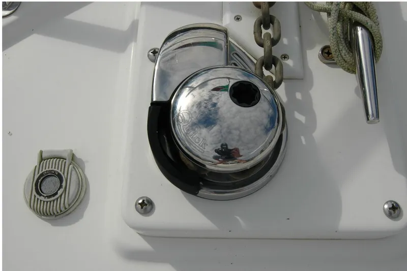 Slide: The Image of Chrome winch and chain on 2014 Back Cove 34 boat deck. - 42