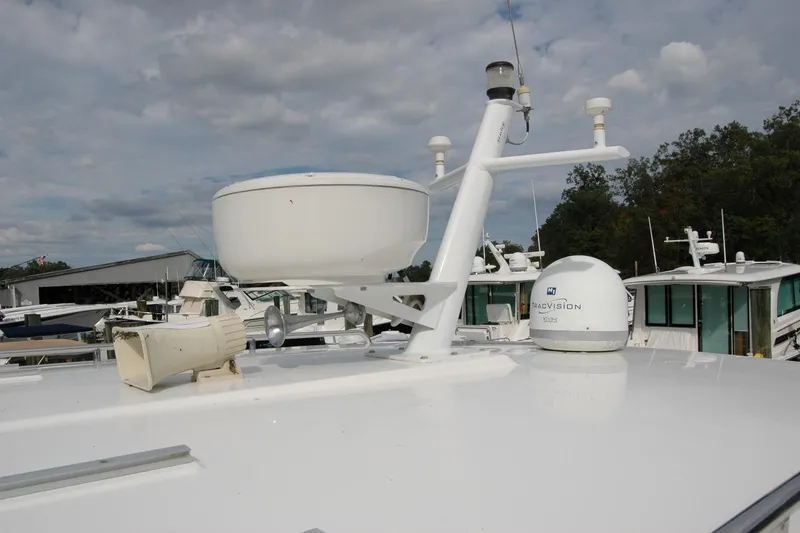 Slide: The Image of 2014 Back Cove 34 yacht with radar and communication equipment on deck. - 45