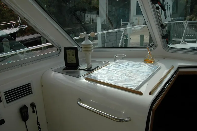 Slide: The Image of Interior of a 2014 Back Cove 34 boat with navigation equipment and chart. - 61