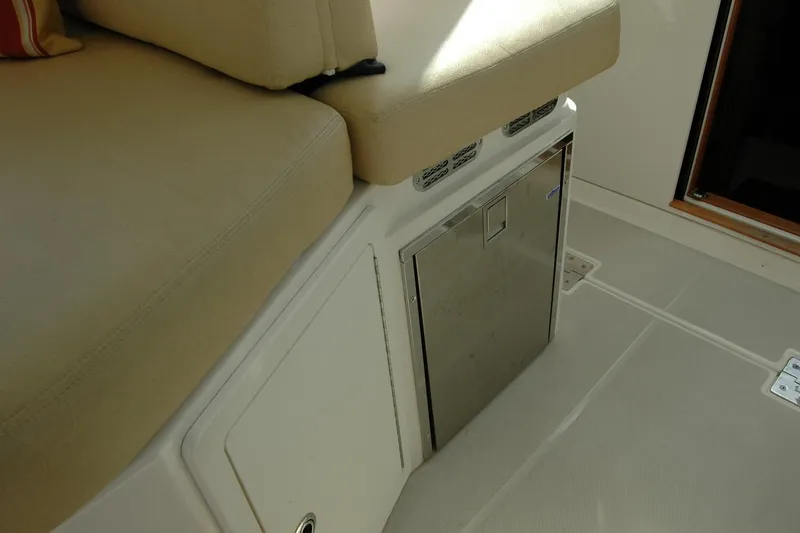 Slide: The Image of Interior seating and storage area on a 2014 Back Cove 34 boat. - 71