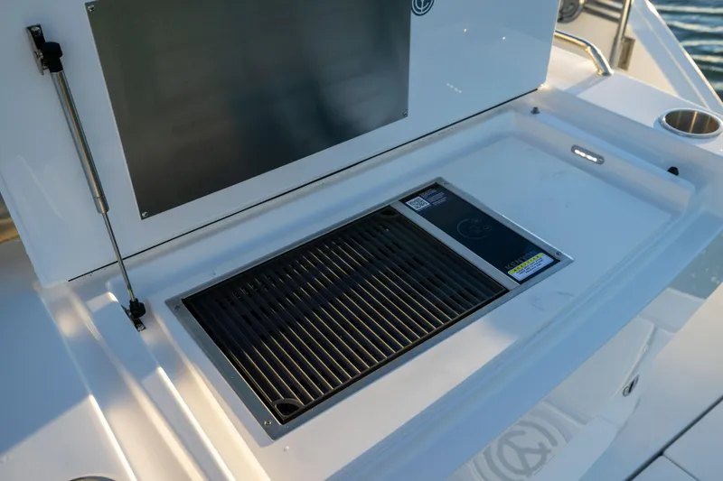 Slide: The Image of Outdoor grill on 2026 Cruisers Yachts 46 Cantius, featuring sleek design and modern amenities. - 12