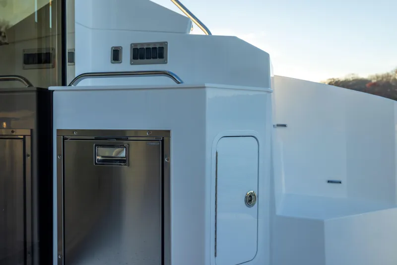 Slide: The Image of 2026 Cruisers Yachts 46 Cantius, sleek exterior detailing with stainless steel accents. - 16