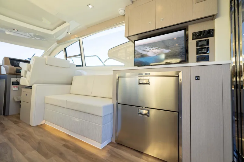 Slide: The Image of Luxurious interior of 2026 Cruisers Yachts 46 Cantius with modern amenities and sleek design. - 19