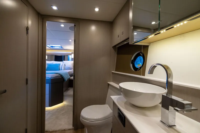 Slide: The Image of Luxurious bathroom interior of 2026 Cruisers Yachts 46 Cantius with modern fixtures and cozy bedroom view. - 33