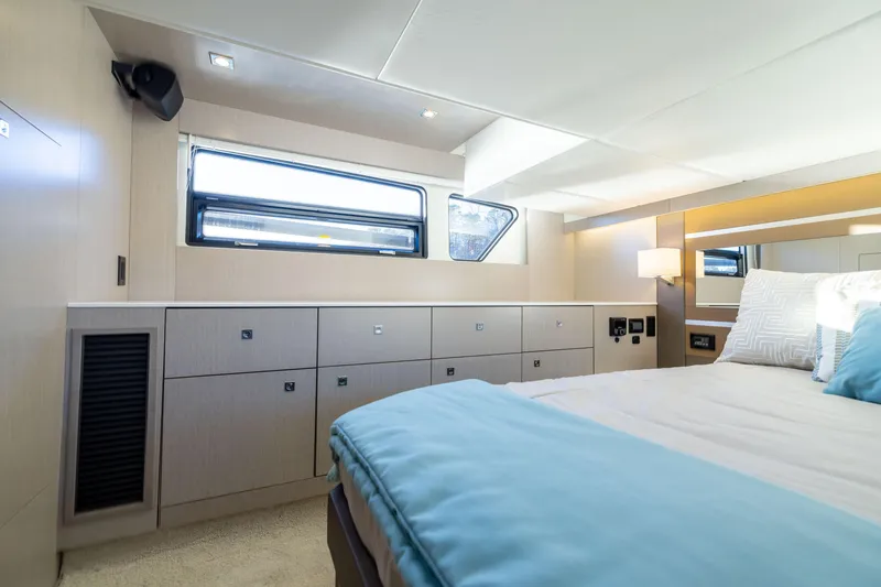 Slide: The Image of Luxurious interior of 2026 Cruisers Yachts 46 Cantius with modern design and comfortable bedding. - 41