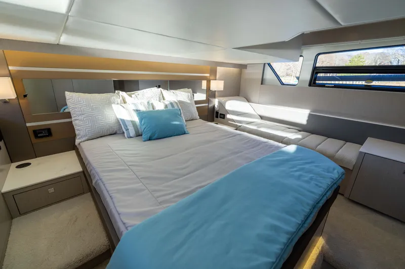 Slide: The Image of Luxurious bedroom interior of 2026 Cruisers Yachts 46 Cantius with modern design and natural light. - 42