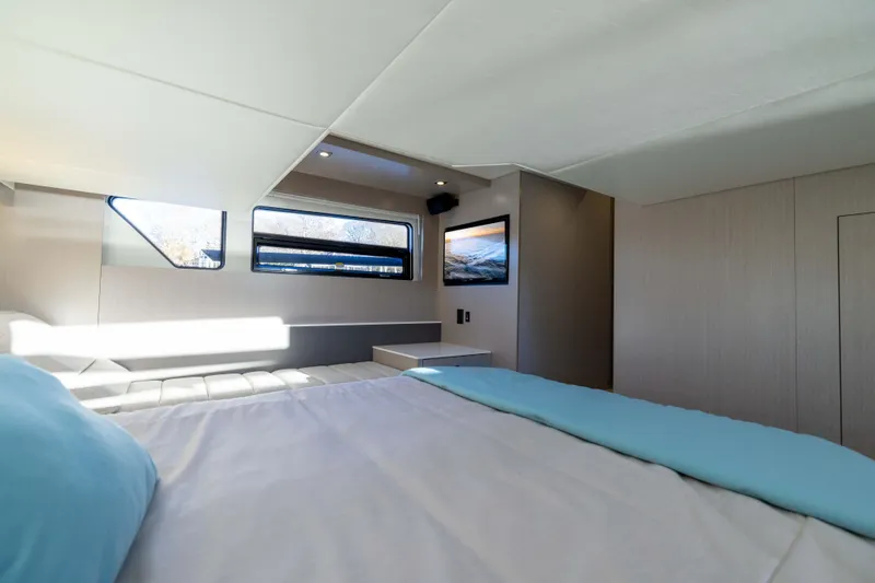 Slide: The Image of Luxurious interior of 2026 Cruisers Yachts 46 Cantius with modern design and natural light. - 44