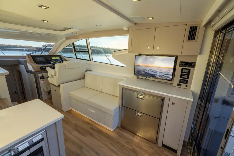 Slide: The Image of Luxurious interior of 2026 Cruisers Yachts 46 Cantius with modern amenities and scenic view. - 18