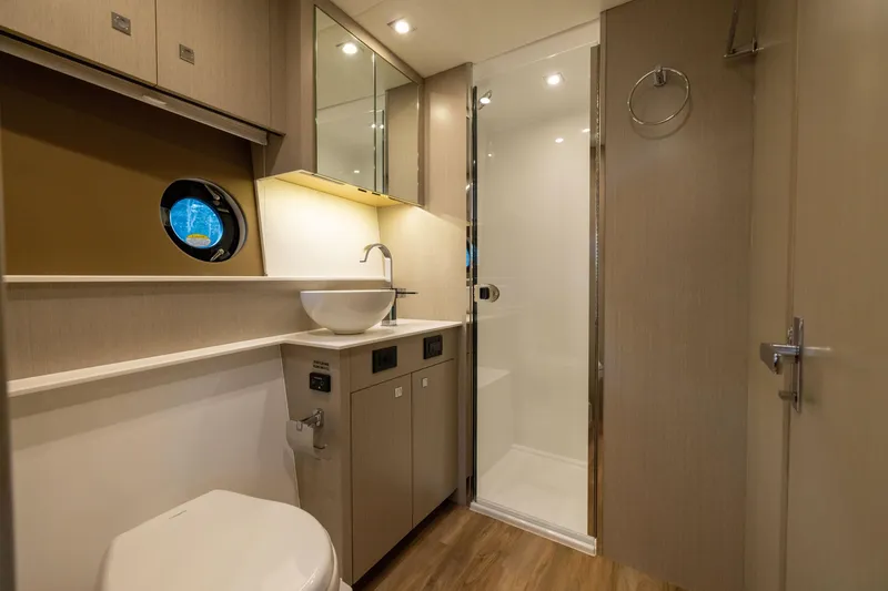 Slide: The Image of Luxurious bathroom interior of 2026 Cruisers Yachts 46 Cantius with modern fixtures. - 31