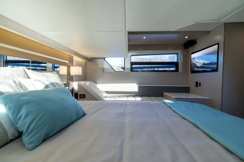 Slide: The Image of Luxurious interior of 2026 Cruisers Yachts 46 Cantius with modern bedroom design. - 43