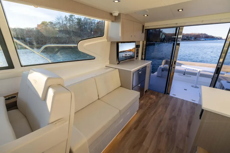 Slide: The Image of Luxurious interior of 2026 Cruisers Yachts 46 Cantius with lake view and modern amenities. - 49