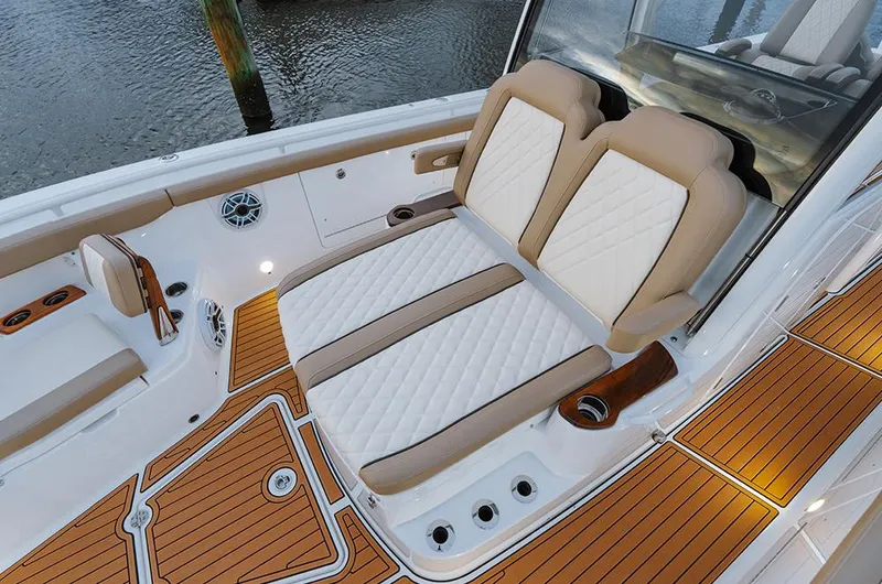 Slide: The Image of Manufacturer Provided Image: 2025 Everglades 315 Center Console boat with luxurious seating and teak flooring. - 5