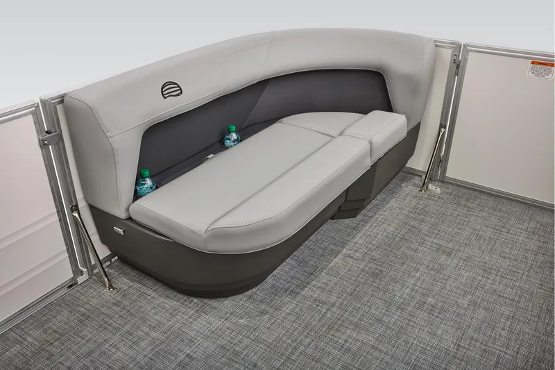 Slide: The Image of Manufacturer Provided Image: 2026 Sun Tracker Party Barge 16 DLX interior seating with gray upholstery and cup holders. - 13