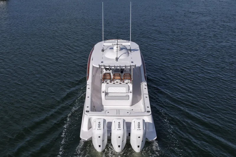 Slide: The Image of 2026 Mag Bay 38 boat with triple 400 V10 engines on open water. - 15