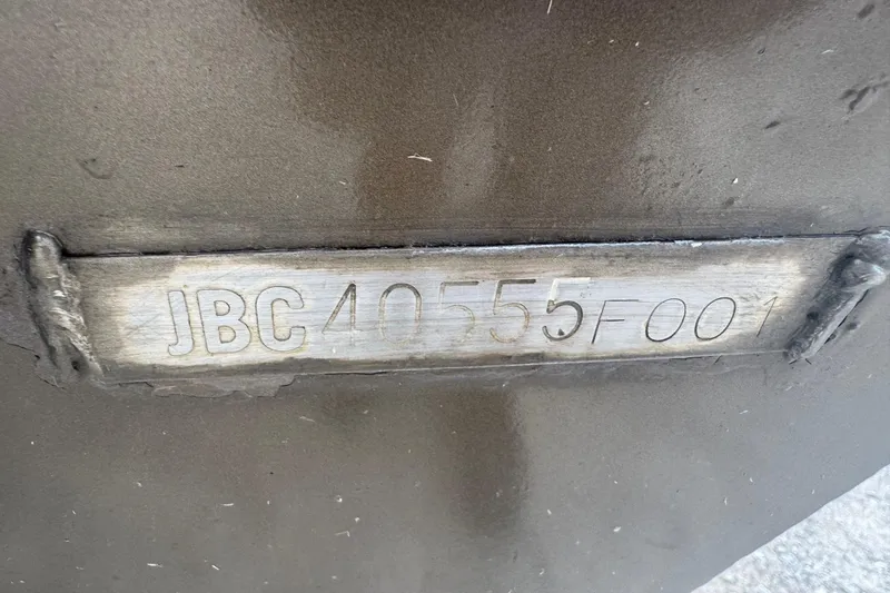 Slide: The Image of Serial number "JBC40555F001" on metal surface, Express X51, year 2000. - 10