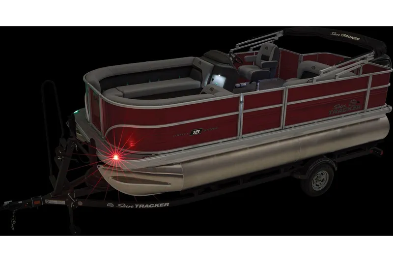 Slide: The Image of Manufacturer Provided Image: 2026 Sun Tracker Party Barge 18 DLX pontoon boat on trailer, red and silver design. - 26